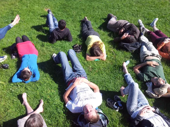 People on the ground during a permaculture course